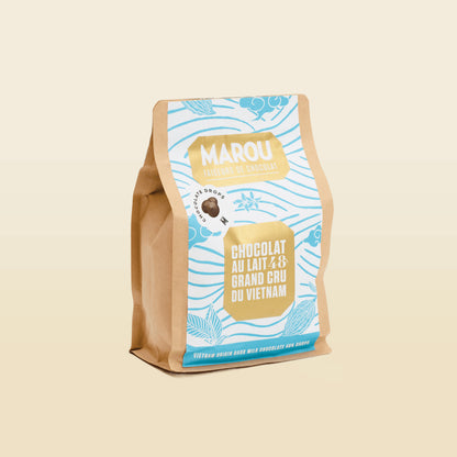 MAROU 48% dark milk chocolate drops pouch, standing brown paper bag with blue label