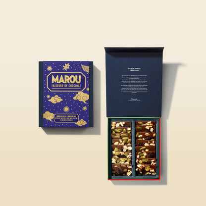 Chocolate mendiant gift box with assorted dried fruits and nuts in open compartments
