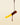 Mango piece coated in dark chocolate with chocolate drip on side