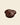 Dark milk chocolate drops, round discs, smooth dark brown