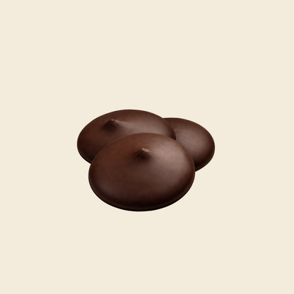 Dark milk chocolate drops, round discs, smooth dark brown