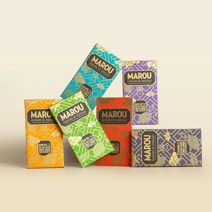 Assorted six single-origin dark chocolate bars with Marou colorful wrappers laid out