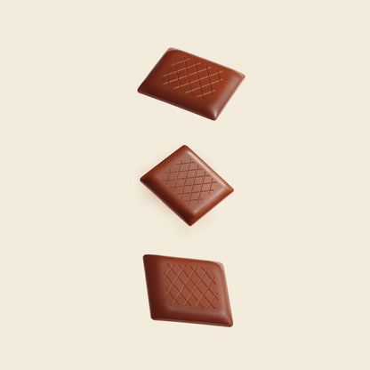 Milk chocolate napolitain pieces with embossed grid and X pattern